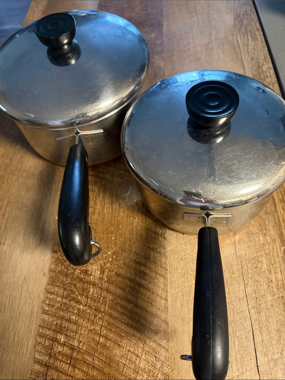 Two Vintage Revere Ware Saucepans, 1qt and two qt, with Lids